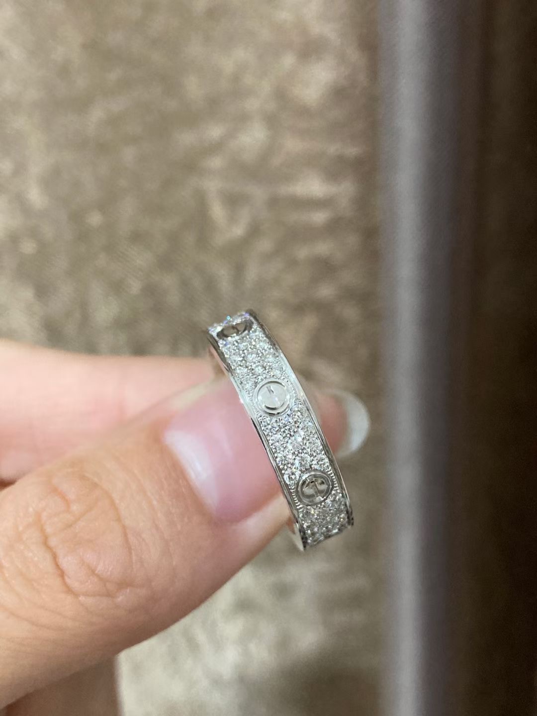 CARTIER LOVE RING IN 18K WHITE GOLD WITH DIAMONDS