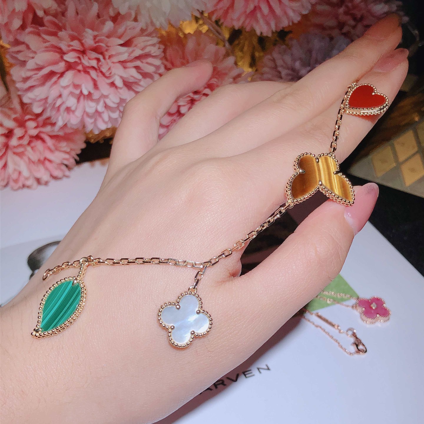 One of Van Cleef & Arpels' favorite themes, nature has inspired the Lucky Alhambra