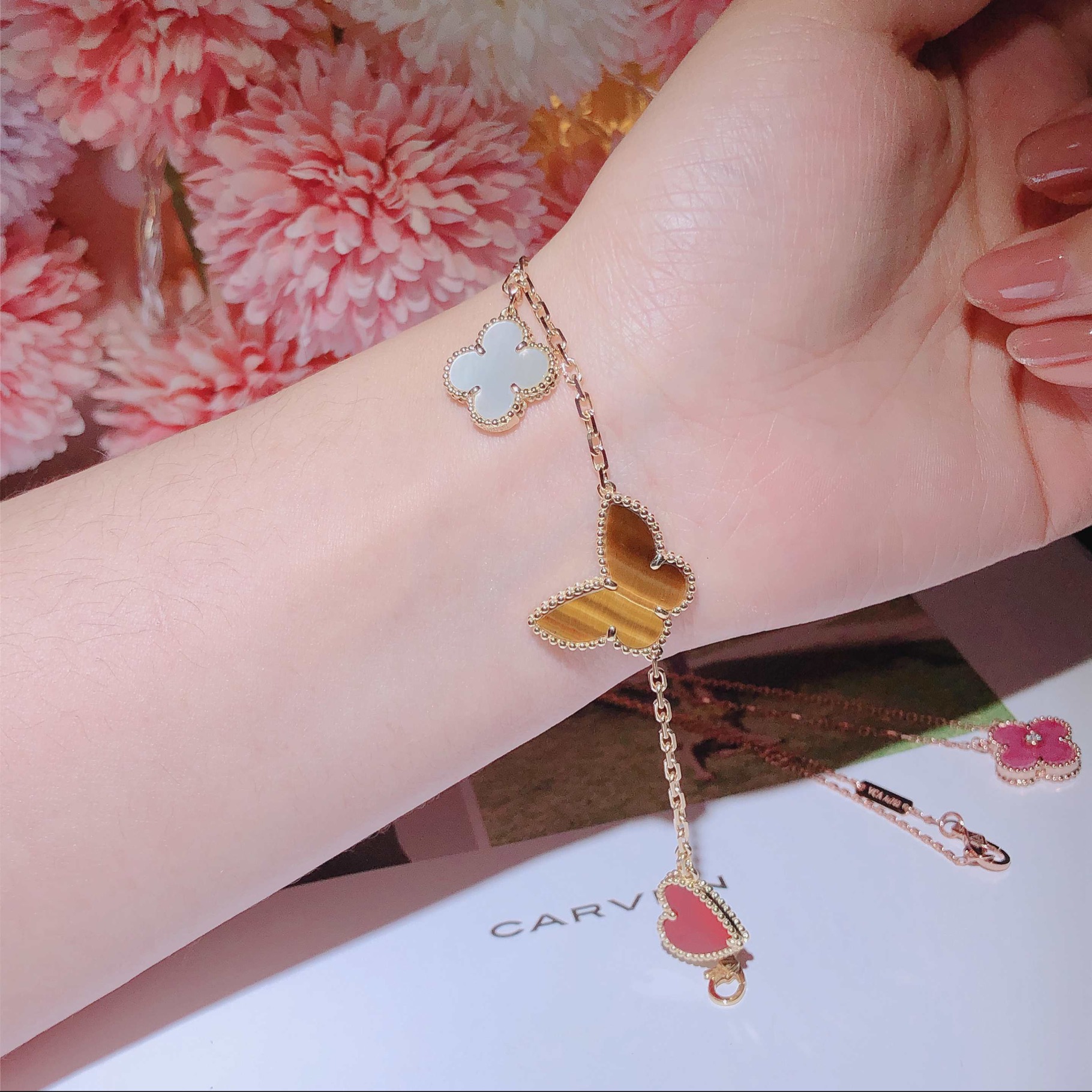 One of Van Cleef & Arpels' favorite themes, nature has inspired the Lucky Alhambra