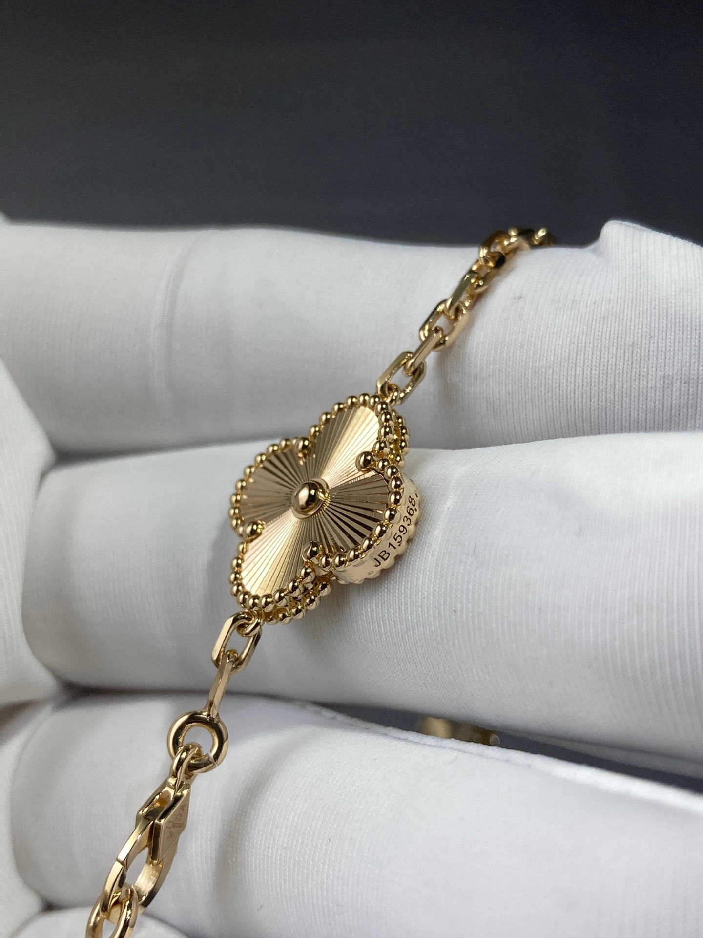 Vintage Alhambra bracelet 5 motifs guilloché yellow 18k gold.