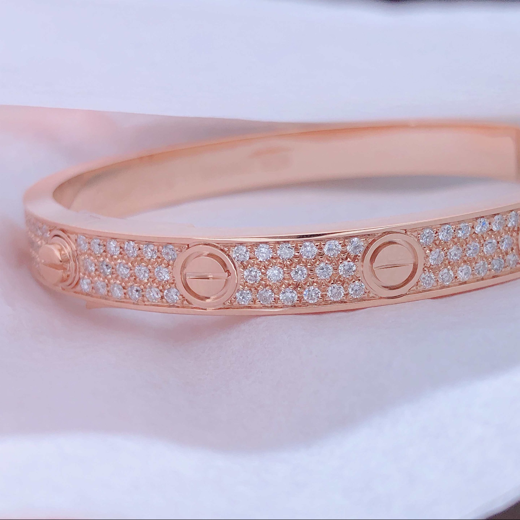 LOVE bracelet, 18k gold, set with 204 brilliant-cut diamonds totaling 1.99 carats. Width: 6.7 mm. Thickness: 3 mm.