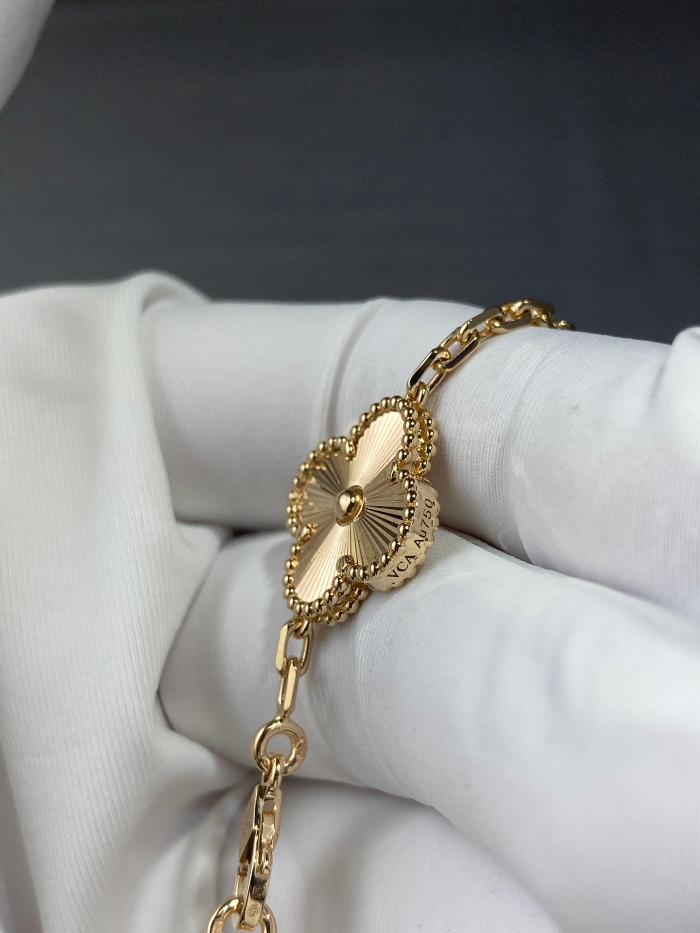 Vintage Alhambra bracelet 5 motifs guilloché yellow 18k gold.
