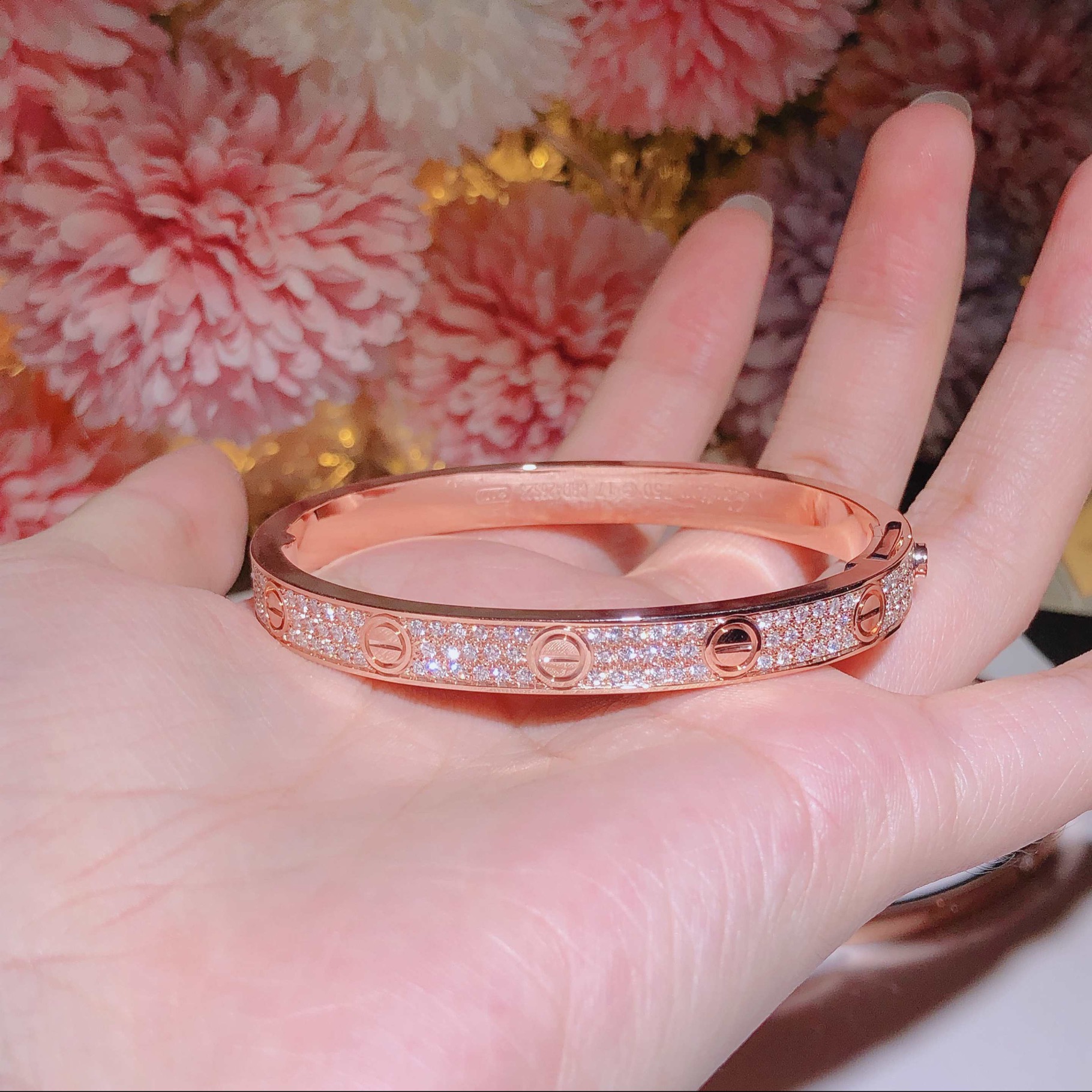 LOVE bracelet, 18k gold, set with 204 brilliant-cut diamonds totaling 1.99 carats. Width: 6.7 mm. Thickness: 3 mm.