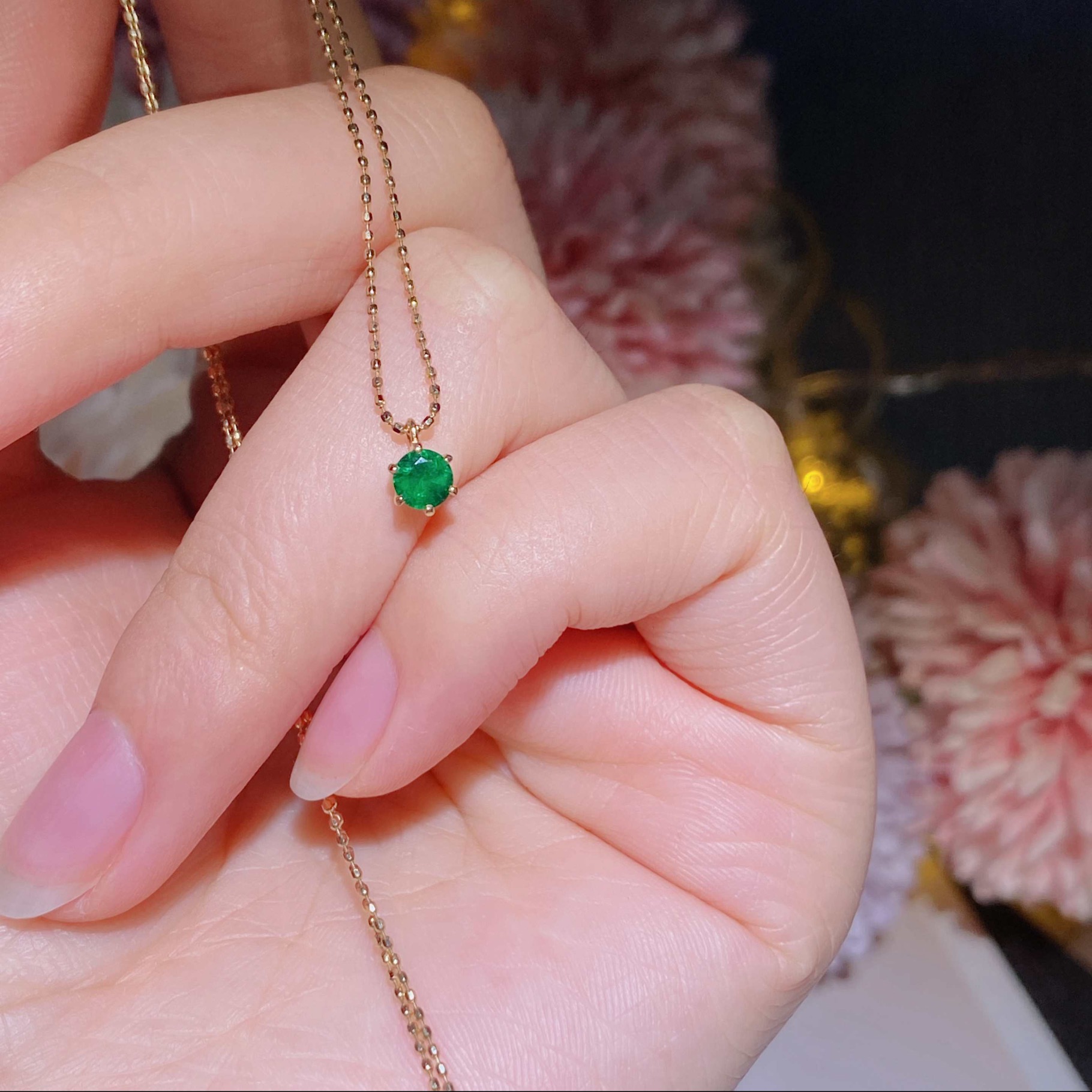 Hong Kong Shop Small Emerald Necklace Set in 18k gold with emerald stones.