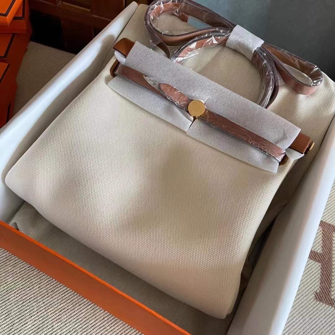Herbag 31 风衣灰拼咖色  金扣