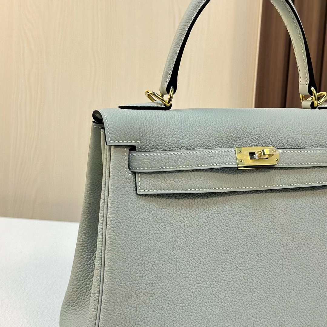 Qatar Doha Hermès KL 25 Togo 0W gris neve Gold Hardware