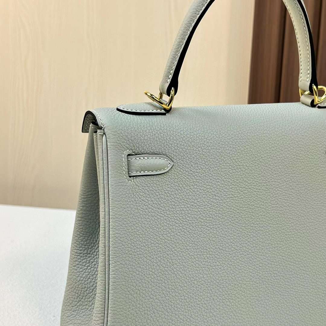 Qatar Doha Hermès KL 25 Togo 0W gris neve Gold Hardware